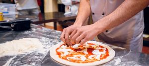 Man making pizza